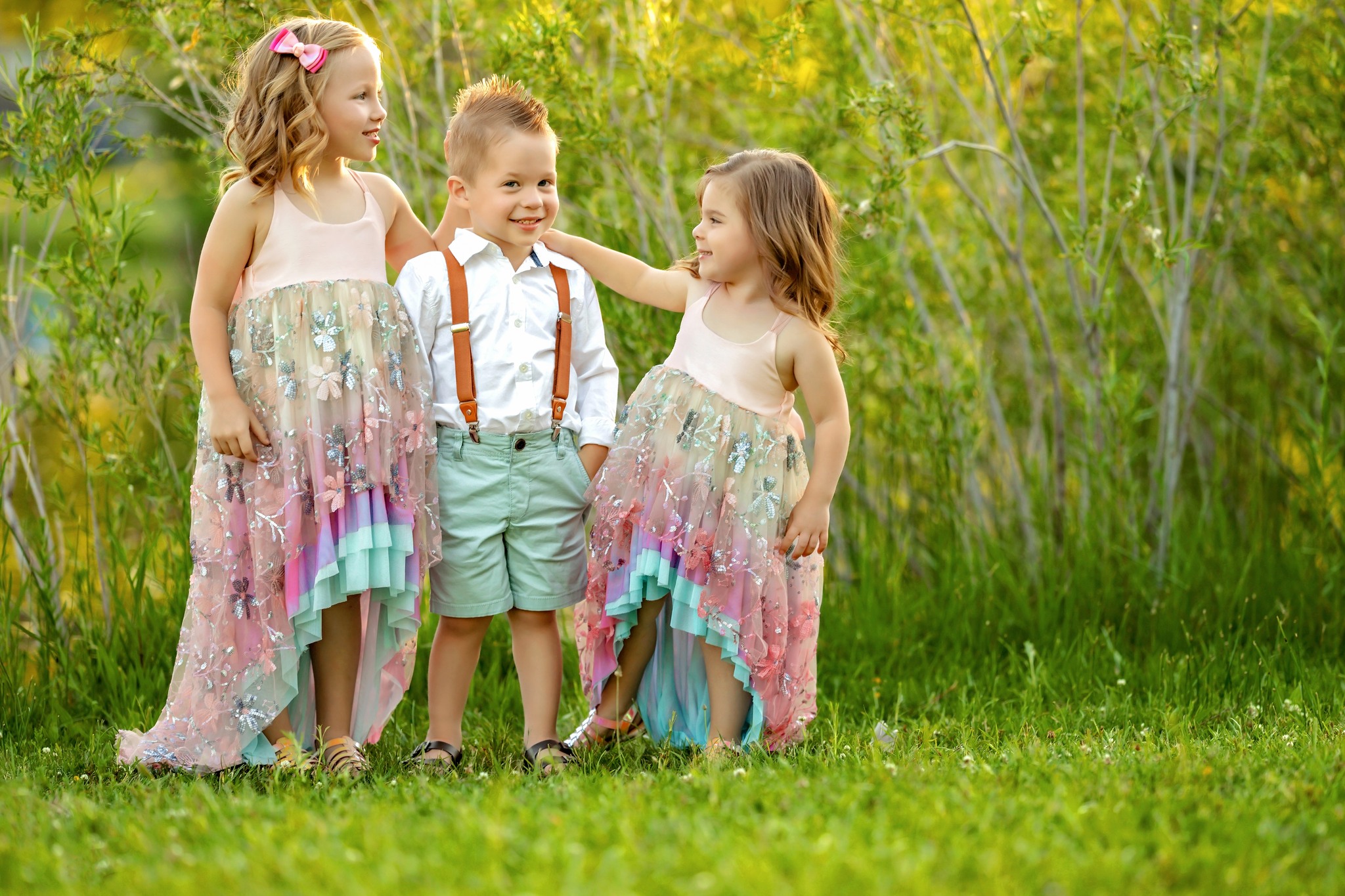 Awesome kiddos enjoying their child session posing together at Viele Lake in Boulder, Colorado. Aspen babysitting.