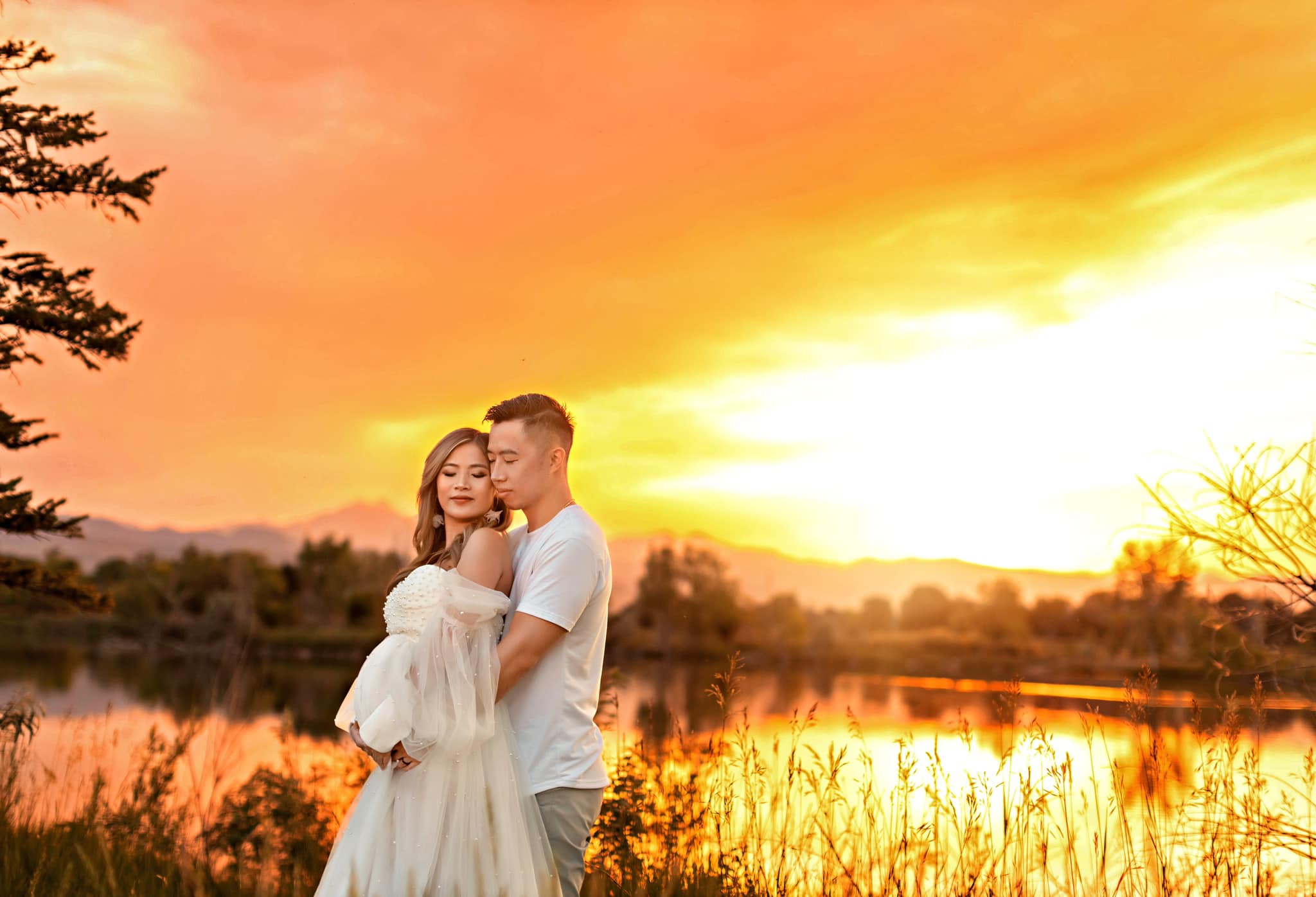 Beautiful sunset at this maternity session at Golden Pond Park in Longmont, Colorado.